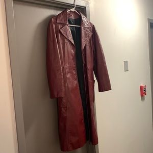 redish maroon leather trench coat. no brand name found. no size available